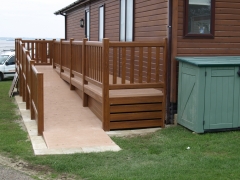 Holiday home decking golden oak & cedar holiday home decking steps park estate lodge installers suppliers manufacturers sundecks vinyl plastic skirting deck board pvc upvc extrusion polymer composite wpc wood free galvanised steel sub-frame